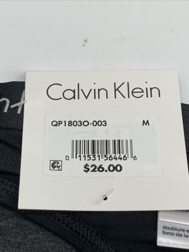 Calvin Klein Women's Motive Cotton Two Thong Panty QP18030-003 Size Med - 2 Pack